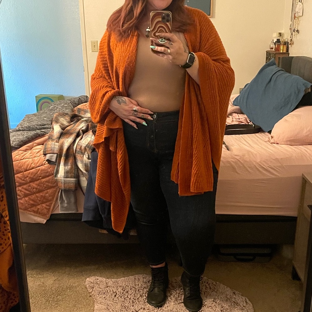 Orange knit poncho